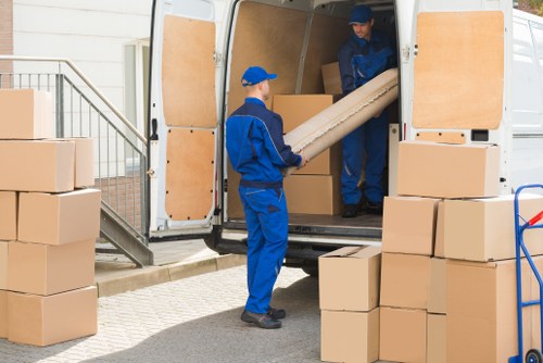 Professional man with van service in Harrow providing efficient moving solutions