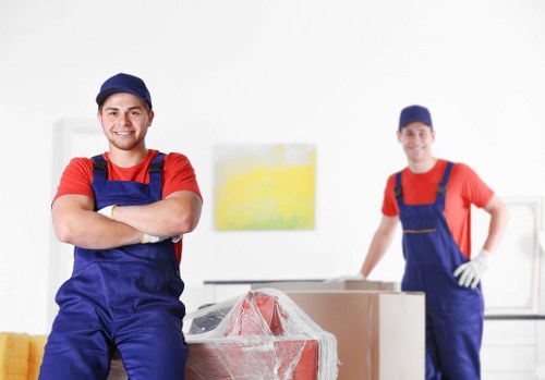 Professional mover loading items in Harrow