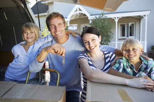 Professional movers assisting with a home move in Harrow
